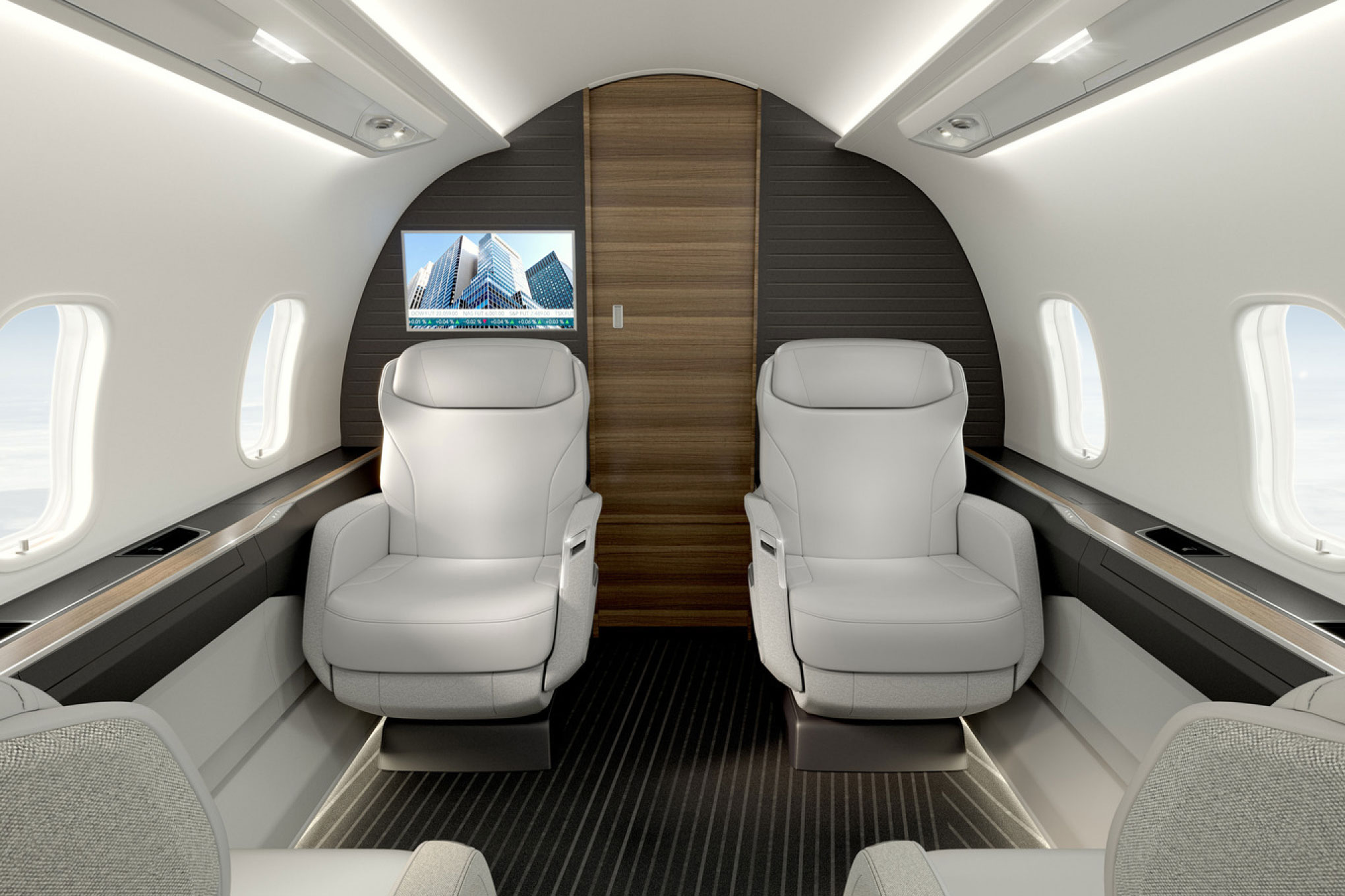 Bombardier Challenger 350/3500 forward cabin club seats facing a monitor
