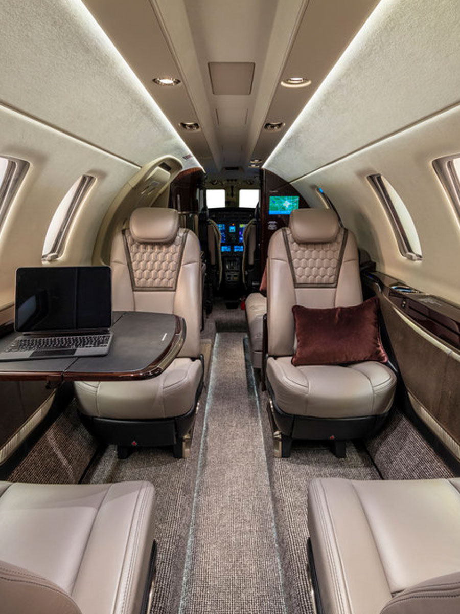 Cessna Citation CJ3 cabin aisle looking forward to the cockpit