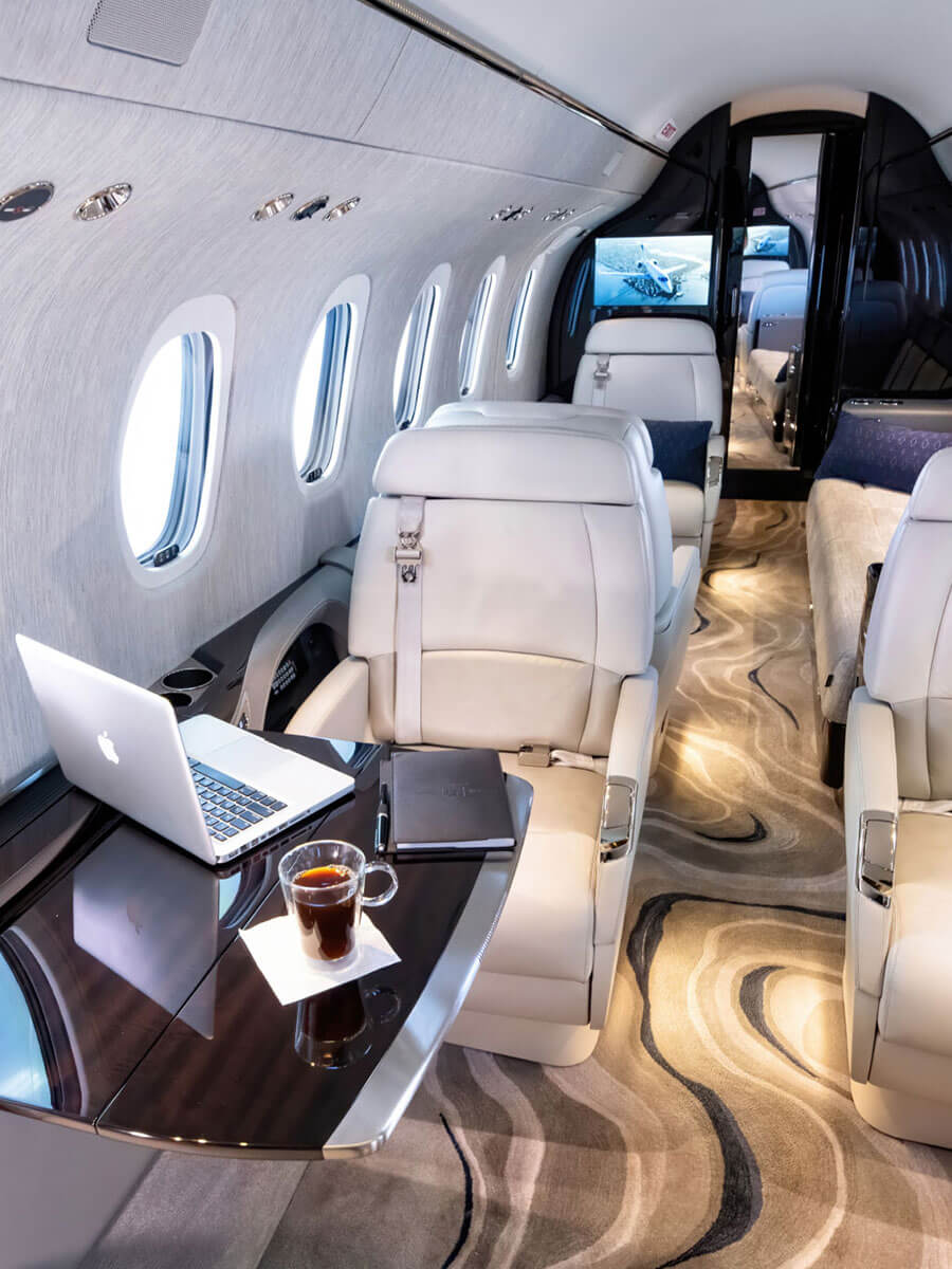 Cessna Citation Longitude cabin club seats and table, portrait view
