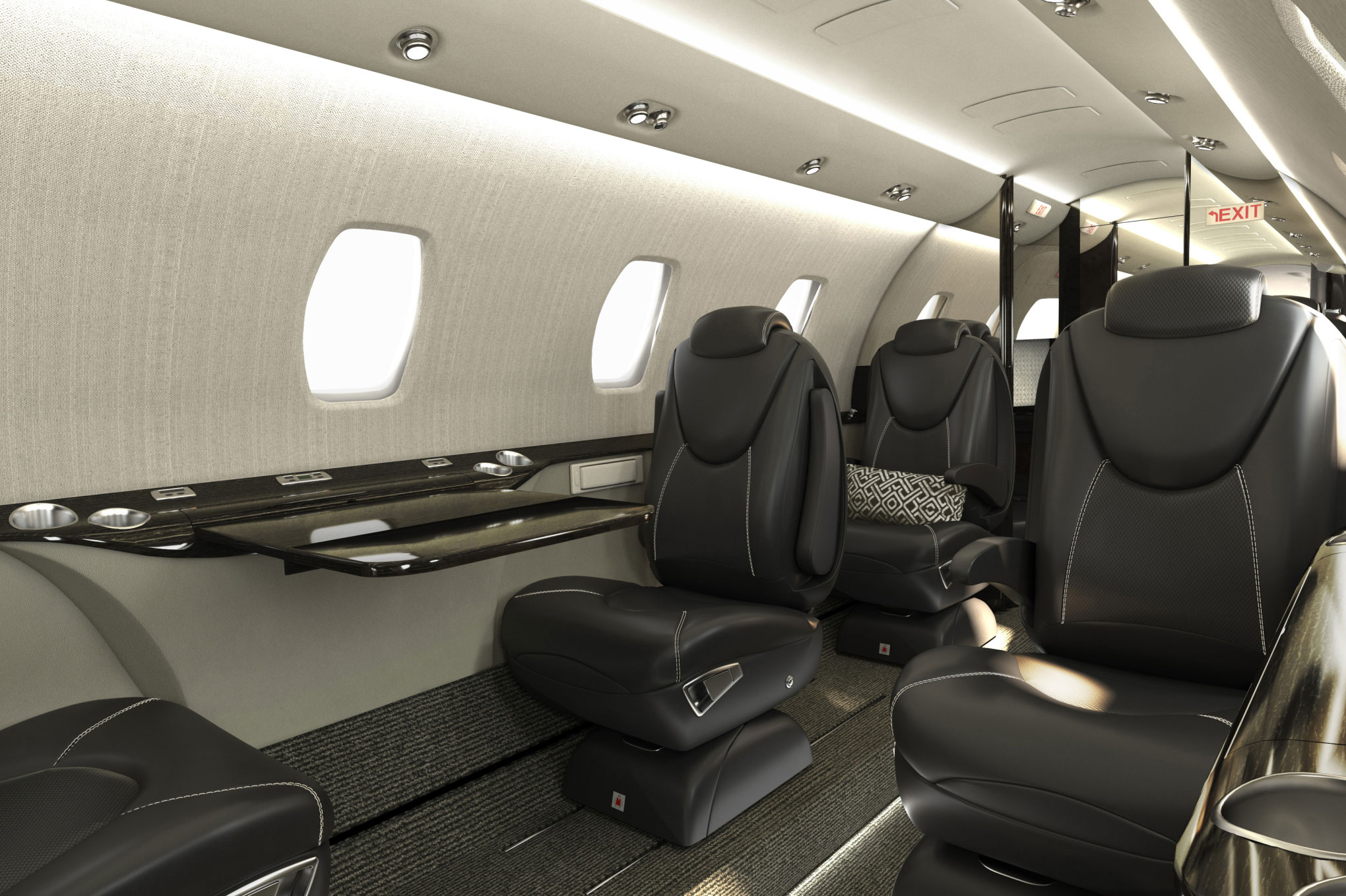 Cessna Citation XLS+ dark leather cabin seats with fold-out tables